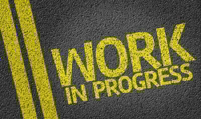 Work In Progress written on the road Work In Progress written on the road