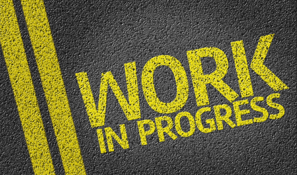 Work In Progress written on the road Work In Progress written on the road